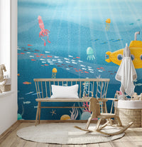 Vibrant underwater sea life mural with colorful marine creatures in kids room.
