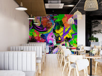 Colorful urban style wall mural with layered graffiti patterns.