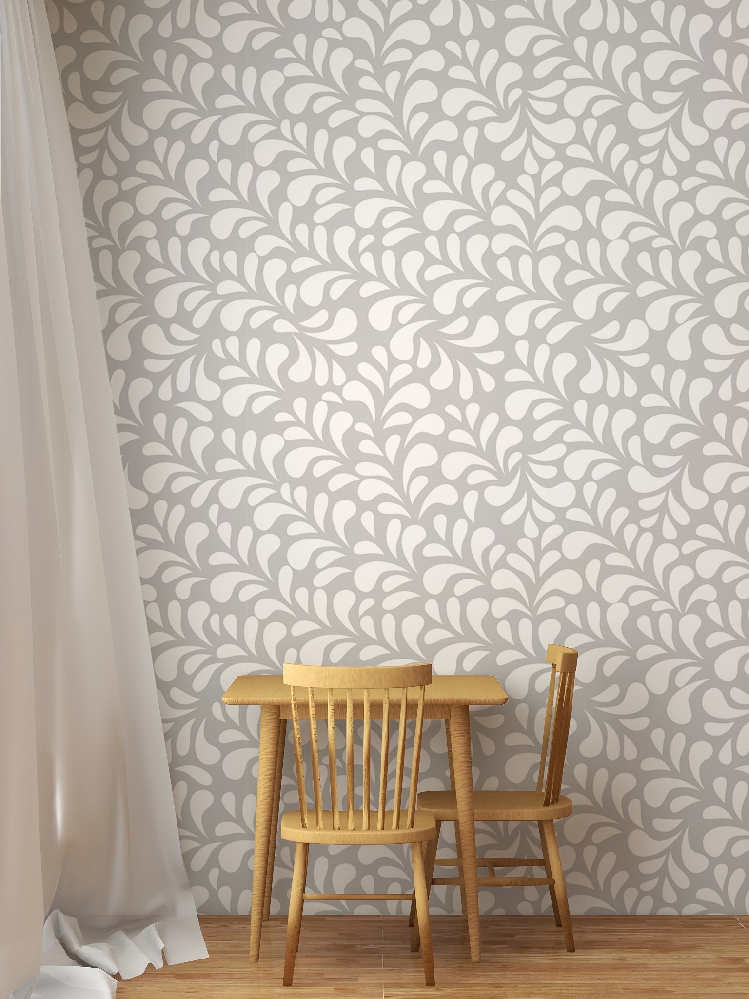 Modern white drops wallpaper in a small dining room.