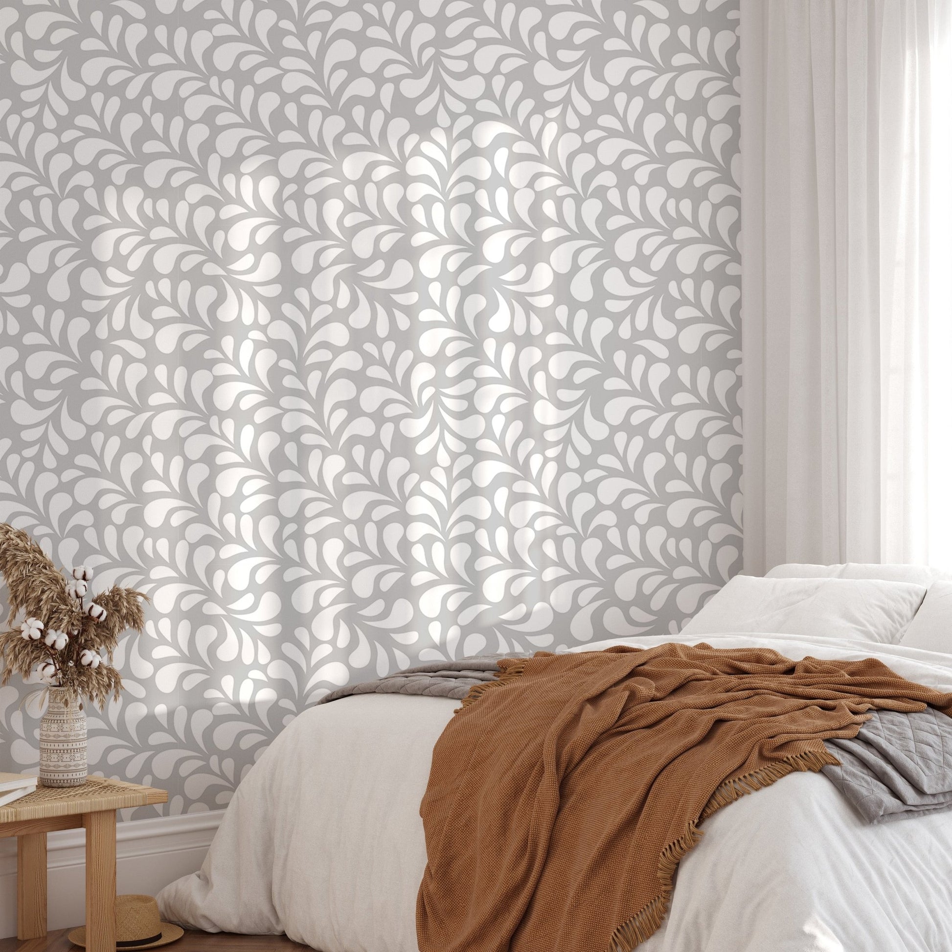 Seamless white drops damask wallpaper in a bedroom with natural sunlight.