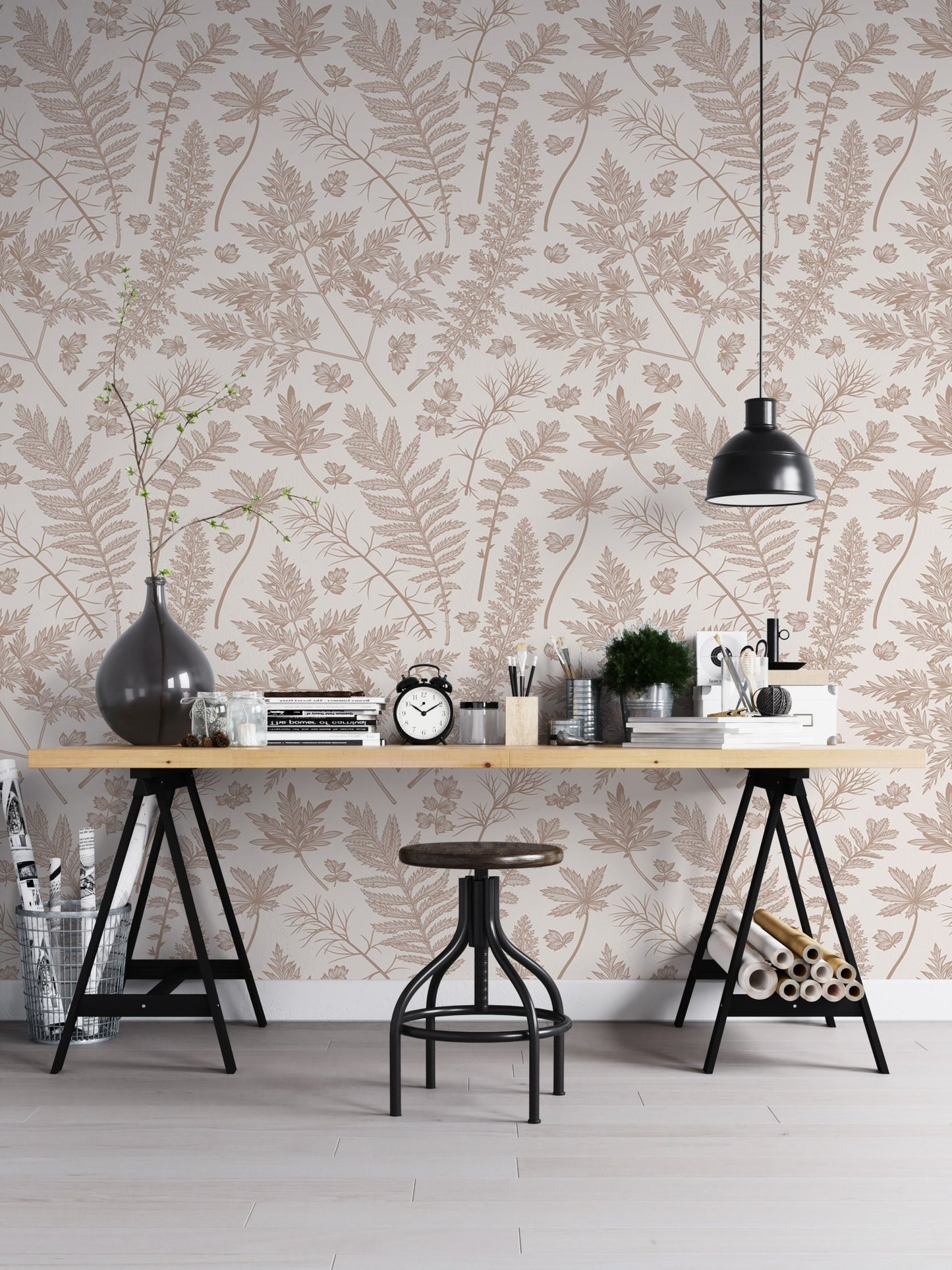 Vertical herbs wallpaper behind a black industrial desk in a home office.