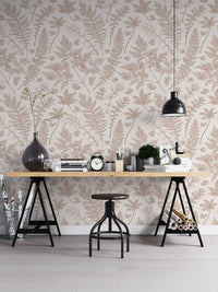 Vertical herbs wallpaper behind a black industrial desk in a home office.