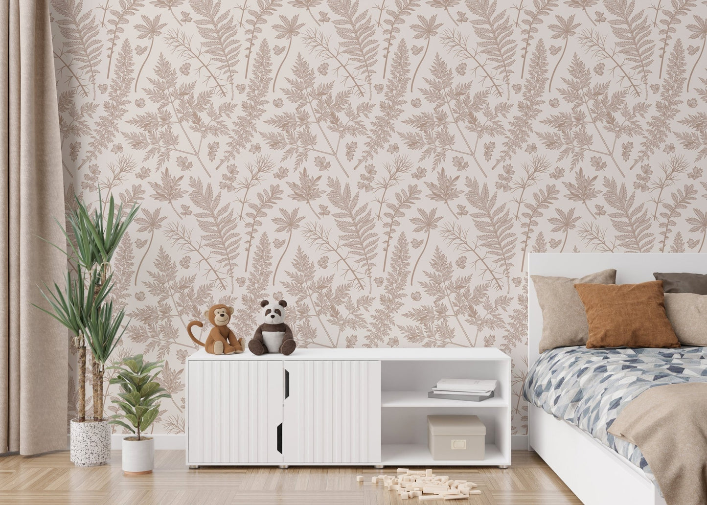 Botanical leaf wallpaper in a kids room with a white cabinet and indoor plants.
