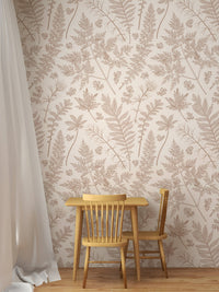 Beige herb pattern wallpaper in a small dining area with a wooden table and chair.