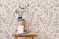 Pastel herb wallpaper behind a wooden bench with a ceramic vase and dried flora.