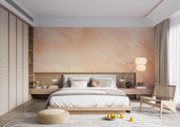 Textured watercolor wallpaper with soft gradient paint strokes for bedroom interior.