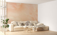 Peach toned watercolor wallpaper with flowing paint layers for hallway.