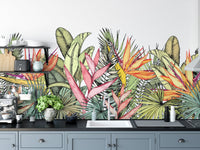 Tropical blooms wallpaper mural with greenery
