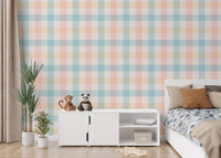 Pastel checkered wallpaper in a modern bedroom with a white side cabinet.