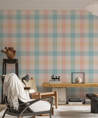 Pastel gingham wallpaper used in a minimalist living room with a white chair.