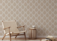 Victorian Brown Butta Damask Repeat Pattern Wallpaper in a reading area with a tan chair.