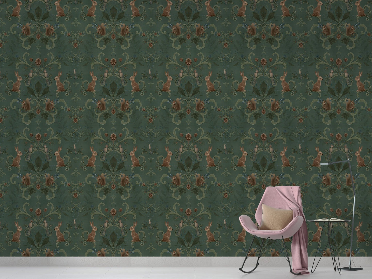 Elegant green wallpaper with forest and animal motifs in living area.