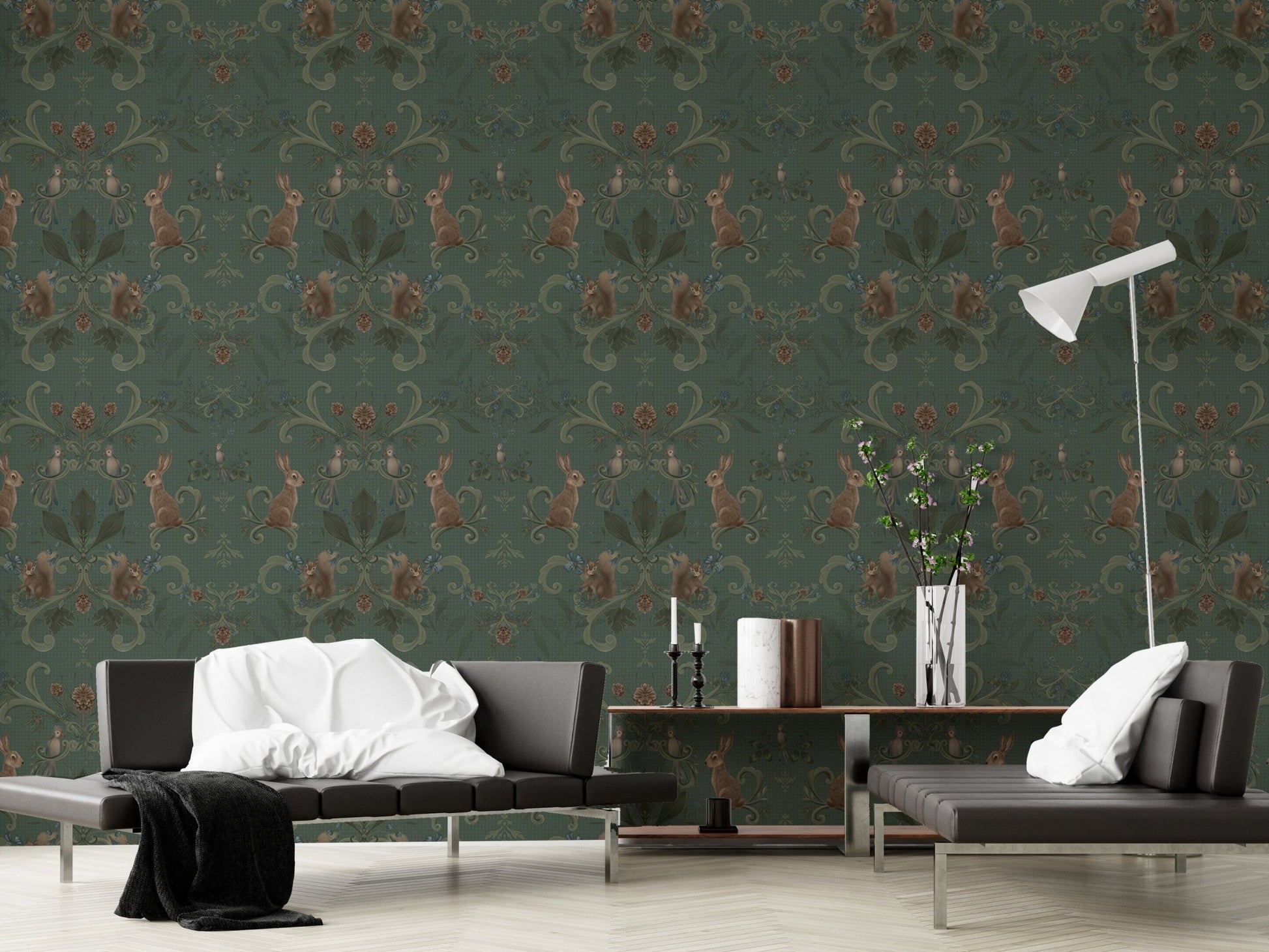 Woodland animal wallpaper in a living room with a grey sofa and floor lamp.