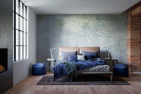 Botanical tree canopy wall mural in muted green and gray wallpaper.