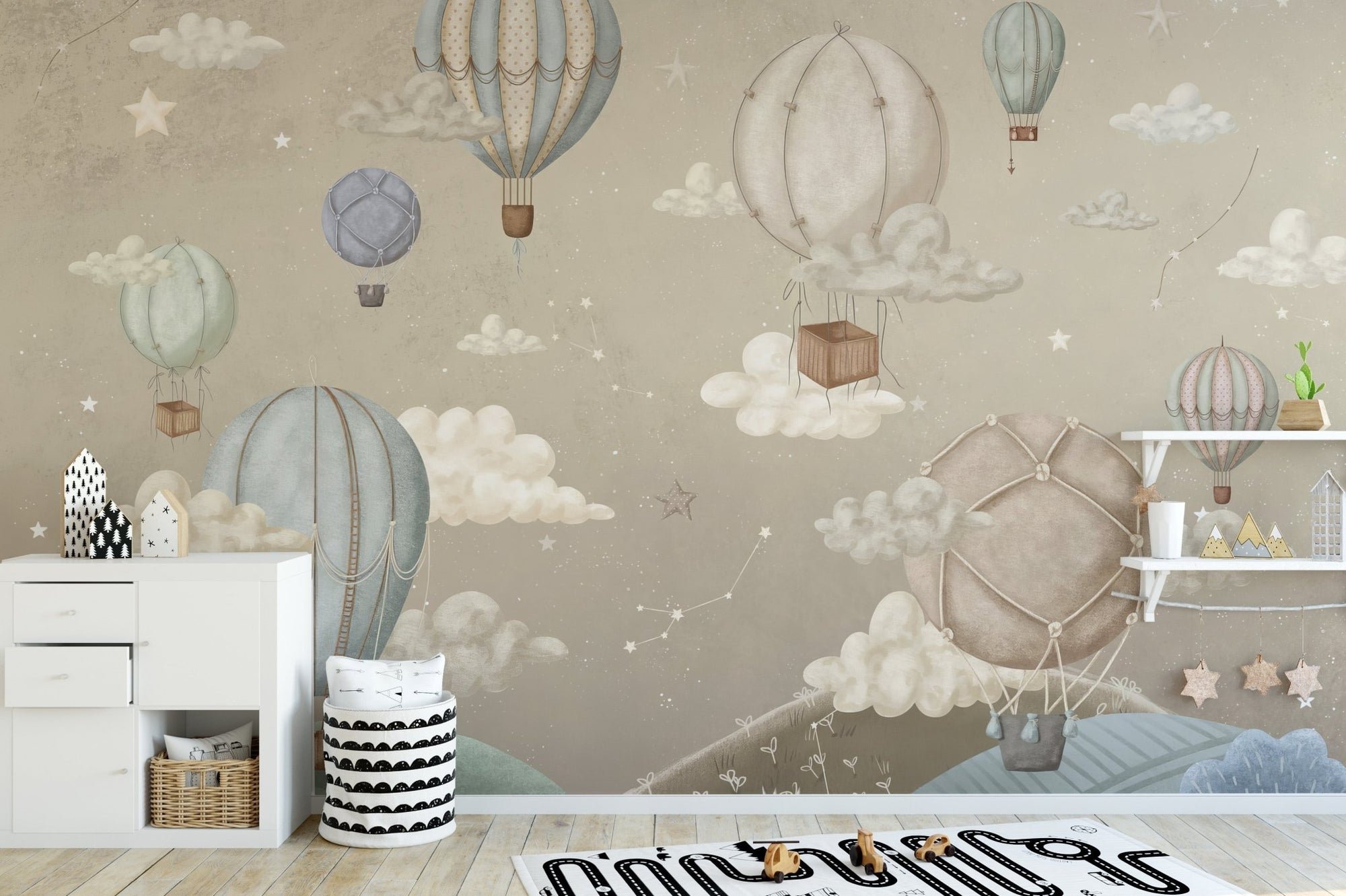 Vintage balloons wall mural with soft sky and hills.