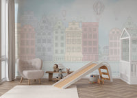 Playroom wall mural featuring old fashioned cars on a light blue road.