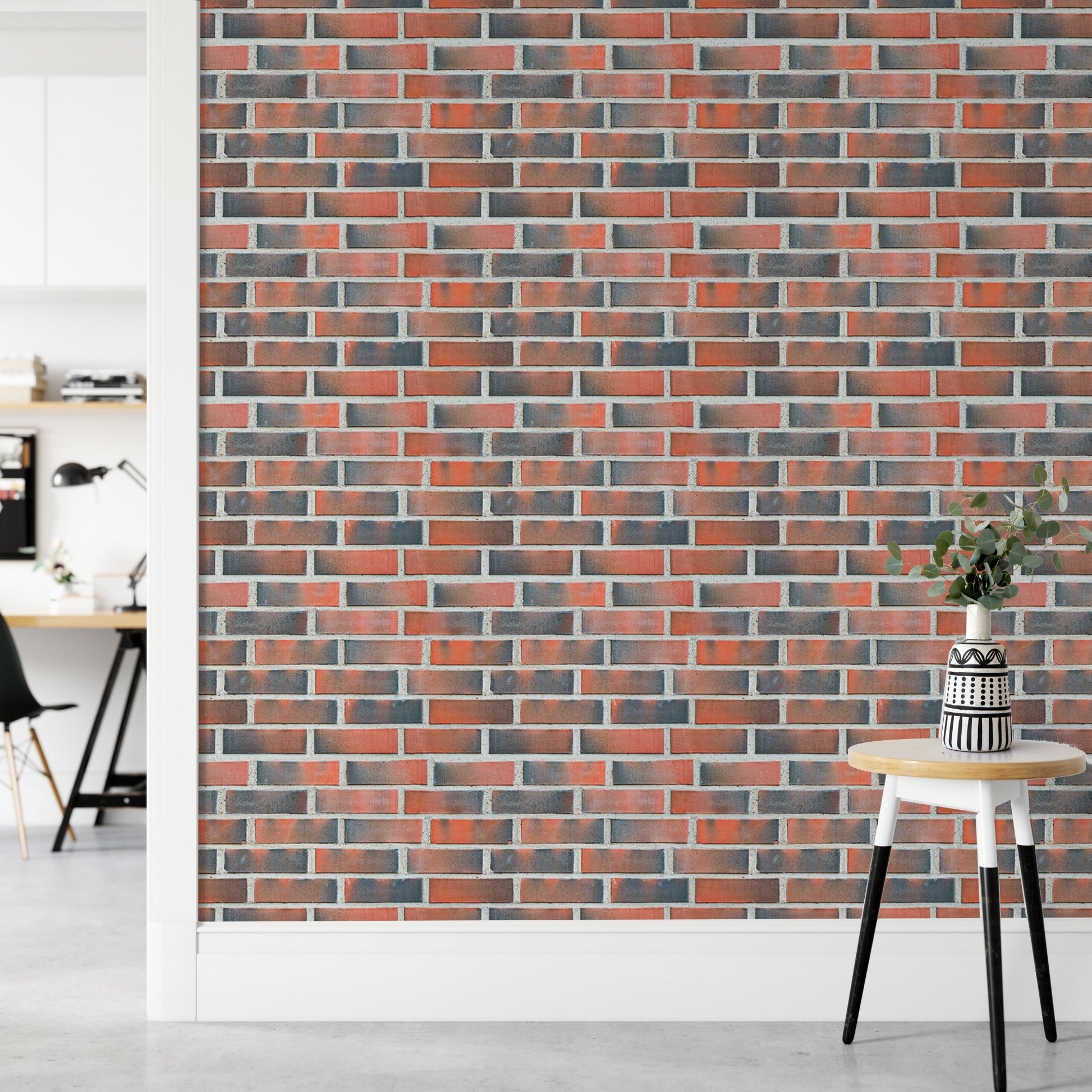 Hallway corner with a small table and brick wall paper.