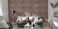 Living room with grey sofa and Vintage Burned Red Lining Brick Wallpaper.