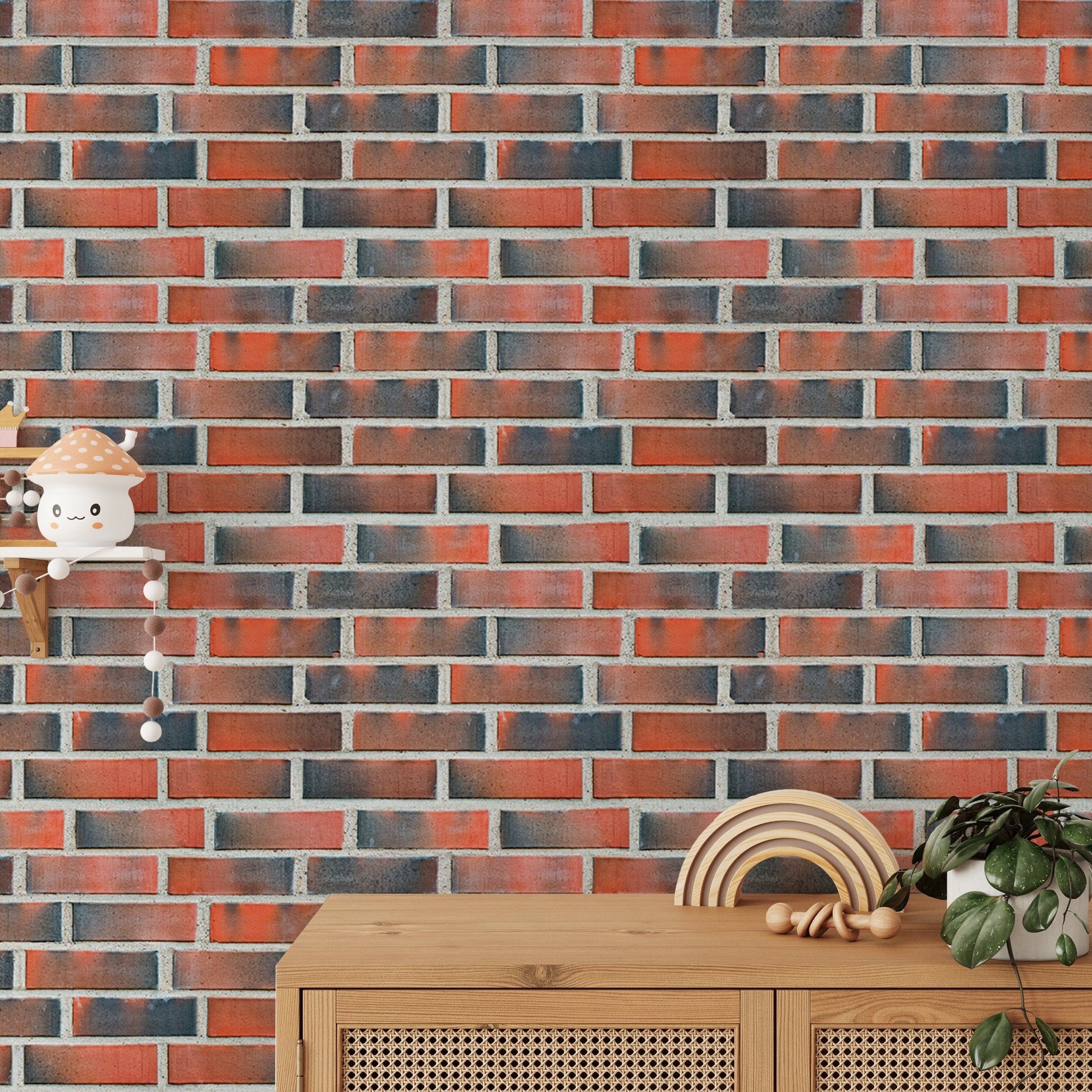 Sideboard with plants against a burned red brick wallpaper.