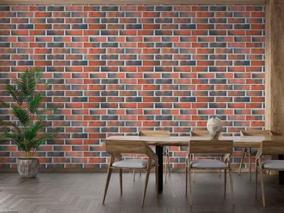 Dining area with wooden table and industrial brick wallpaper.