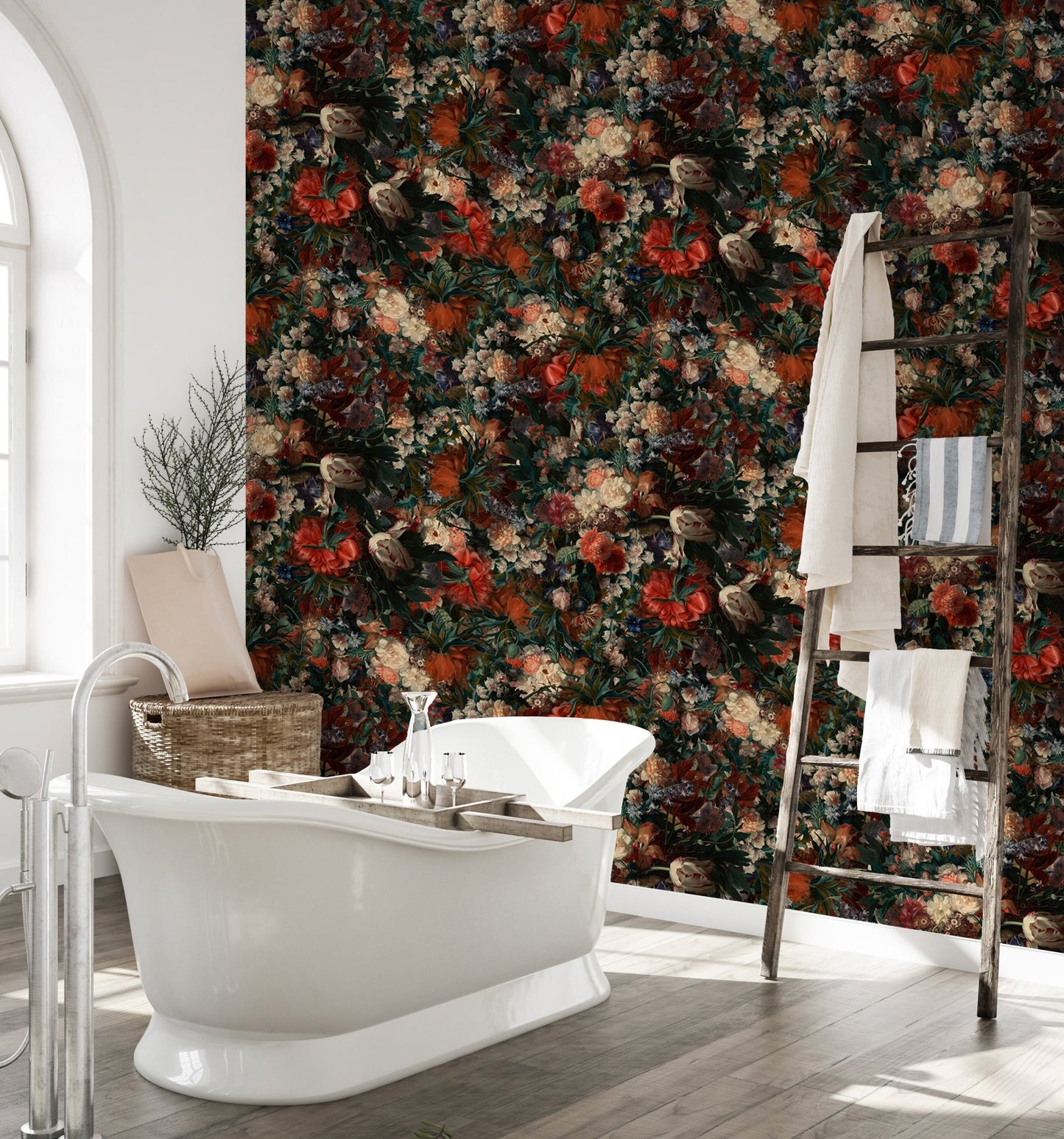 Bathroom featuring a floral wallpaper behind a white freestanding bathtub.