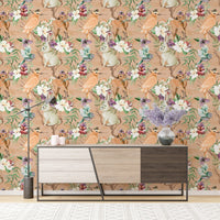 Vintage forest animals wallpaper in a modern entryway with a sleek console table