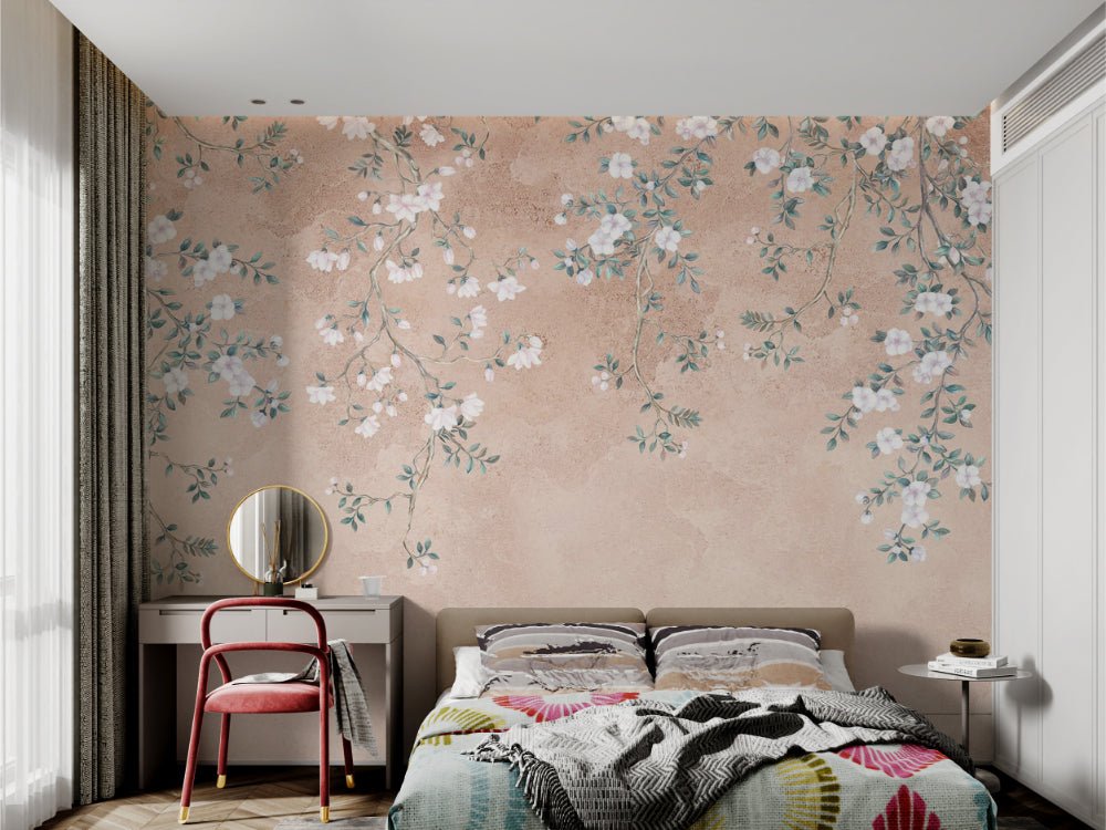 White floral branch wall mural on a textured peach surface for bedroom.