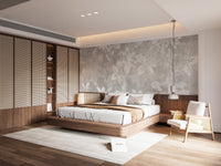 Vintage Floral Charm Wallpaper behind a bed in a warm, modern bedroom.
