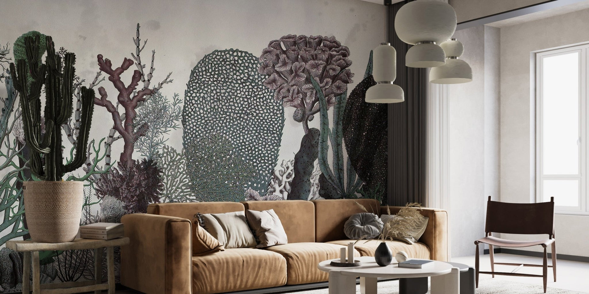 Vintage Floral Green Leaves Wall mural behind a tan leather couch in a study.