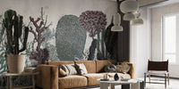 Vintage Floral Green Leaves Wall mural behind a tan leather couch in a study.