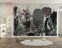 Minimalist wall mural featuring cacti and leaves in a contemporary play space.