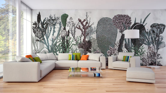 Dark green botanical wall mural in a spacious living area with floor to ceiling windows.