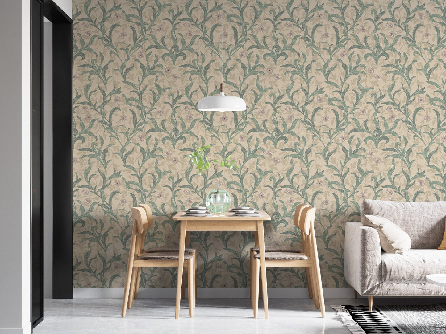 Dining area with table and chairs featuring green floral leaf wallpaper.