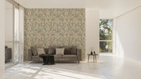 Modern sofa in a bright room with green floral vine wallpaper.