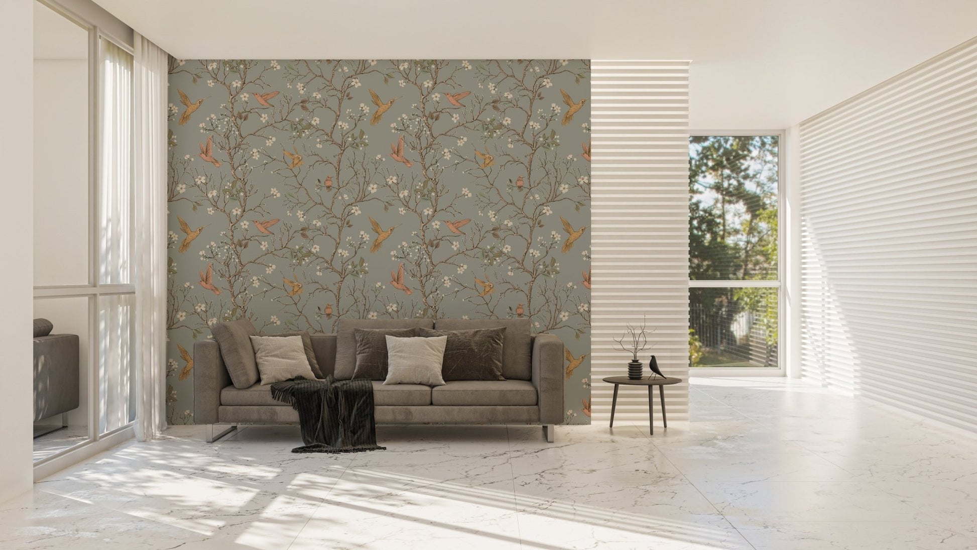 Minimalist living room showcasing a muted botanical garden wallpaper and grey sofa.