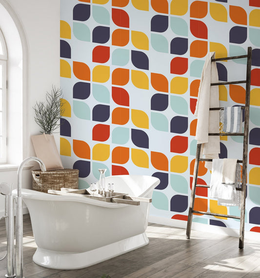 Retro geometric design wallpaper in a bright bathroom near a wooden ladder shelf.