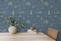 Nautical island wall mural in a reading area with a wooden table