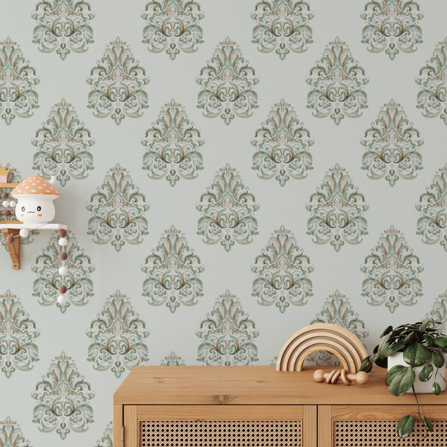 Green damask wallpaper in a child's room with light wood storage furniture.