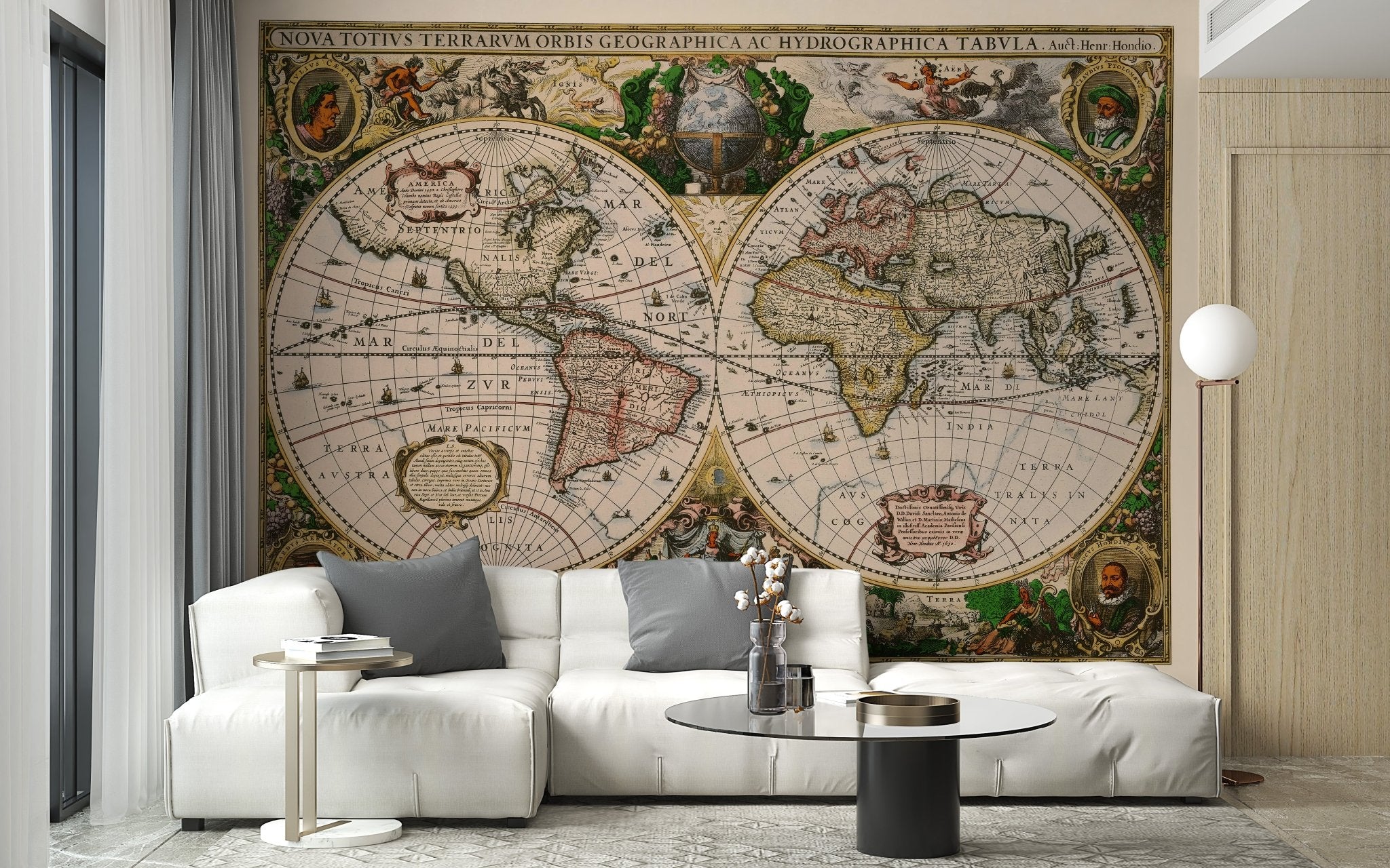 Vintage map wall mural in a living room with a white sofa.