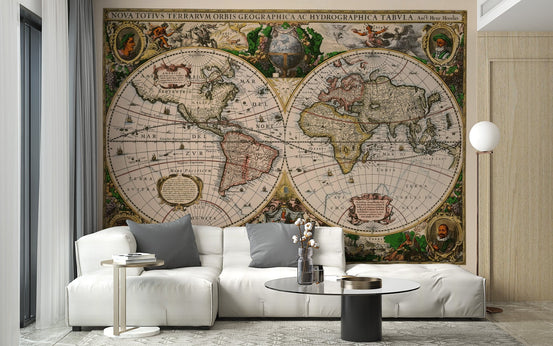 Vintage map wall mural in a living room with a white sofa.