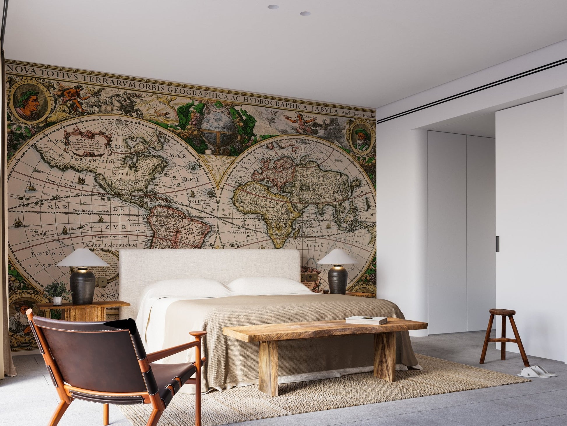 Detailed map wall mural in a bright bedroom with a wooden bench.