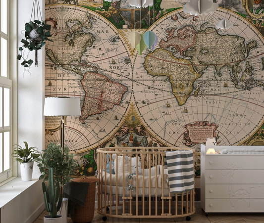 Antique map wall mural behind a wooden crib in a nursery.