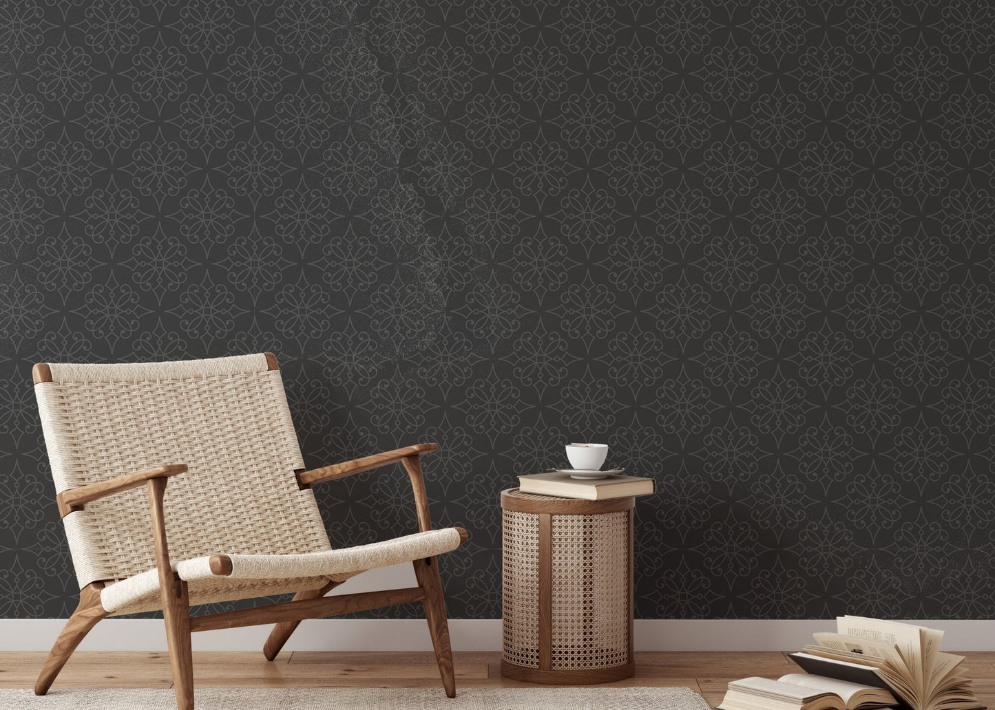 Textured black wallpaper in a reading area with a wooden armchair and side table