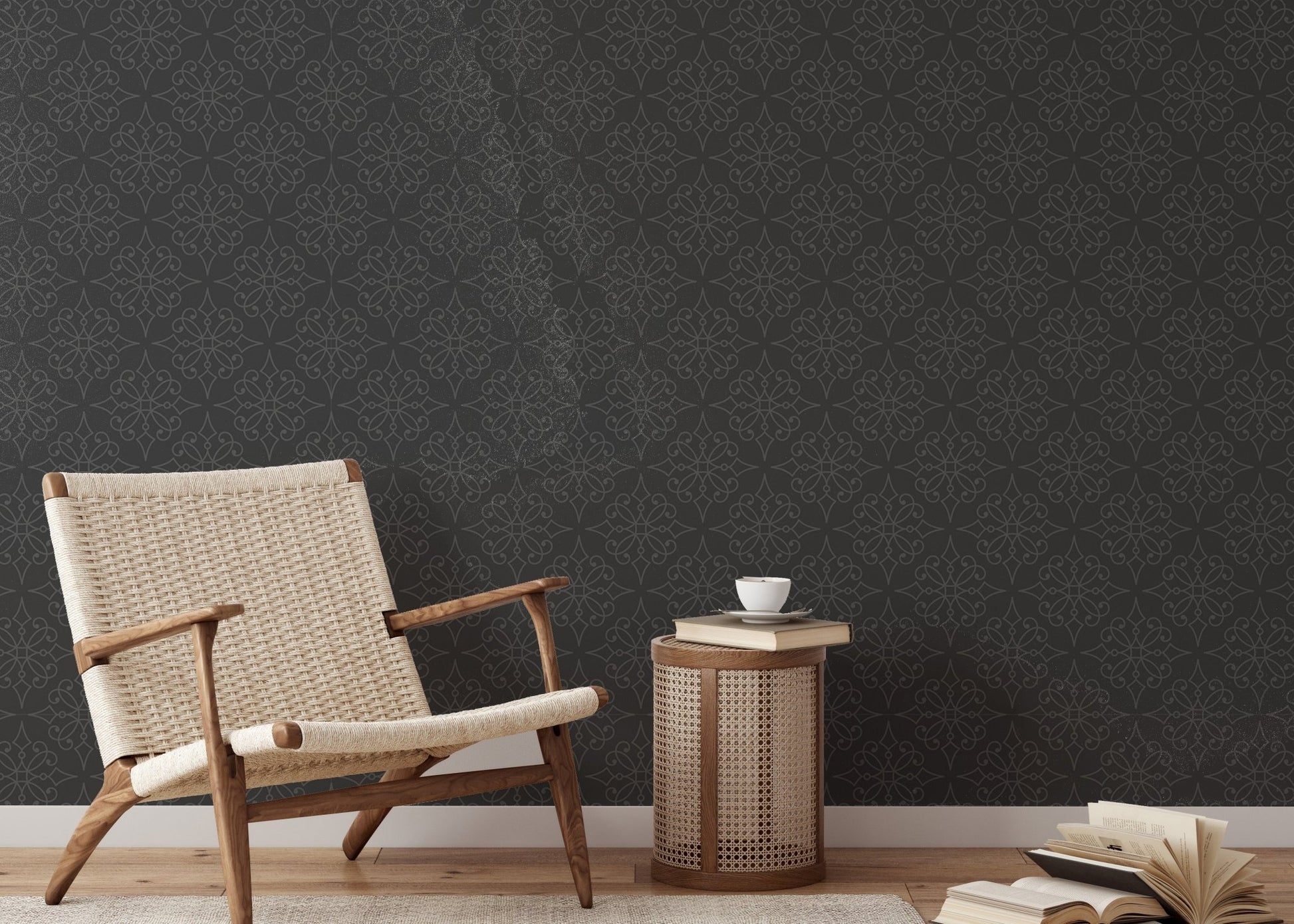 Textured black wallpaper in a reading area with a wooden armchair and side table