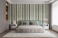 Vertical striped wall mural in muted teal and grey tones for a master bedroom.