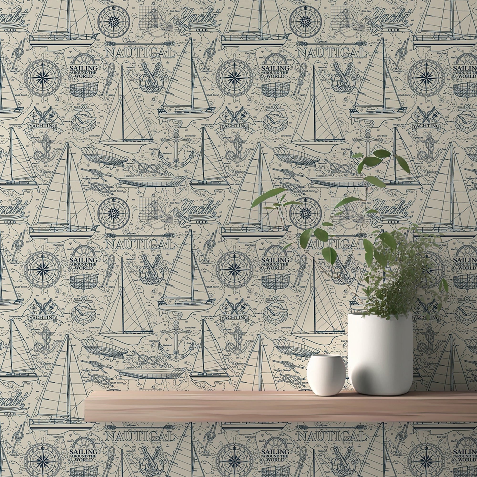 Nautical wallpaper with blue sailboats and compass on a beige textured wall.