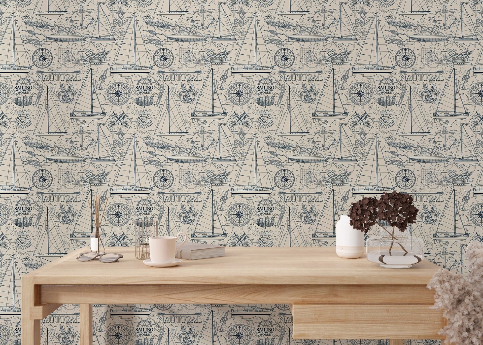 Yachting elements wallpaper behind a minimalist wooden study desk.