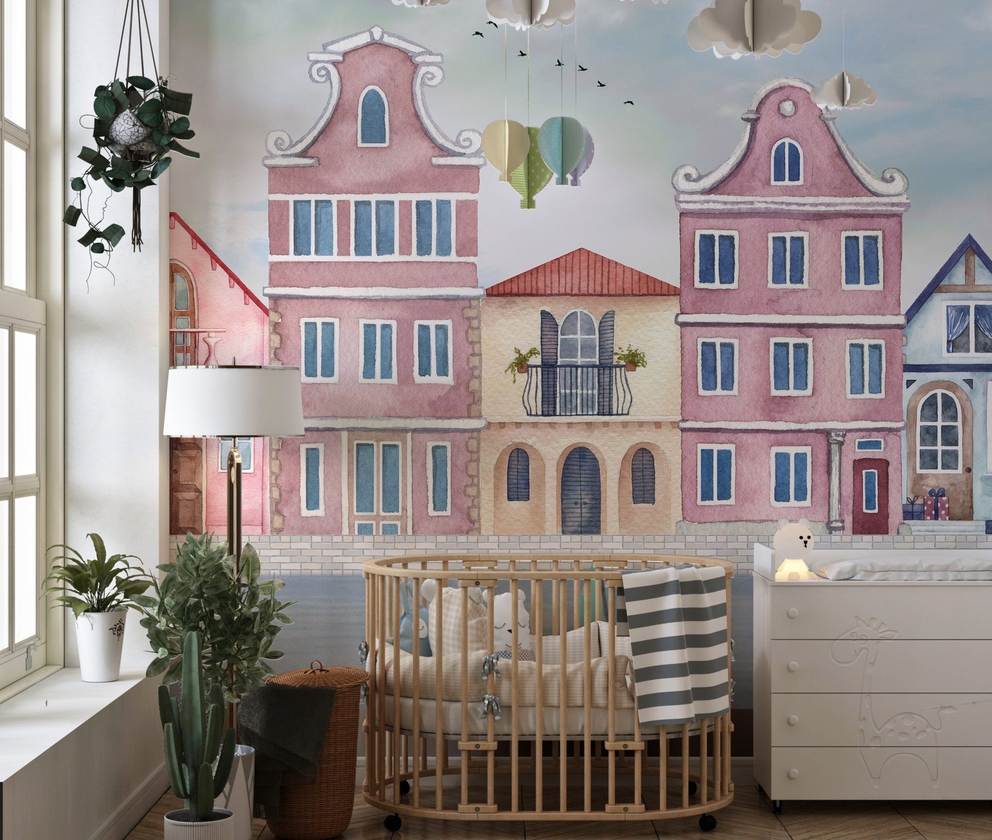 Artistic waterfront houses wall mural in muted coastal color palette.