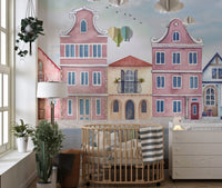 Artistic waterfront houses wall mural in muted coastal color palette.