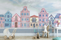 Coastal homes wallpaper mural in gentle watercolor illustration style.